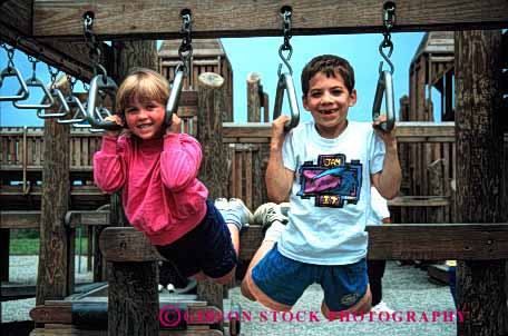 Stock Photo #1902: keywords -  boy children climb exercise girl hang horz model play playground released social together