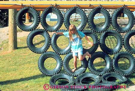 Stock Photo #16724: keywords -  british canada child children climb climbed climber climbing climbs columbia equipment fun girl girls granville horz in island kid kids outdoor outdoors outside play playground playgrounds playing plays recreation recycle recycled recycles recycling reuse reused set sets tire tires vancouver youth