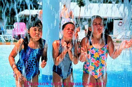 Stock Photo #3346: keywords - bathing children ethnic girls horz humor park released splash suit summer swim water