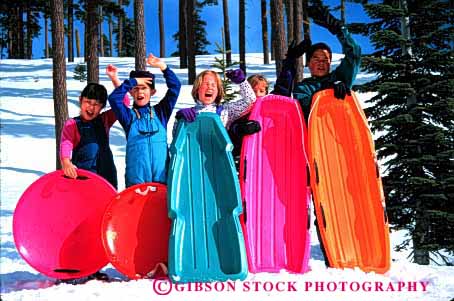 Stock Photo #1908: keywords -  - african american asian black california child children color colorful colors ethnic four friends gender genders group horz japanese kids minority mix mixed mt. plastic play playing recreation released salute season shasta sled sledding sleds snow social team together winter