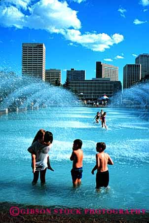 Stock Photo #1911: keywords -  childre city cool fun group play pool recreation shallow social summer together vert water