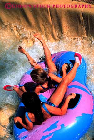 Stock Photo #1916: keywords -  fast fun girls model park plastic play raft recreation released ride scare slide speed splash summer team thrill vert water wet