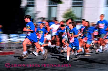 Stock Photo #1923: keywords -  action blue blur child children competition foot group horz legs motion move race run speed sport summer