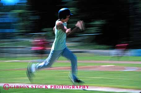 Stock Photo #1925: keywords -  action adolescent base baseball blur child competition dynamic effort exercise girl horz league little motion physical recreation running softball speed sport