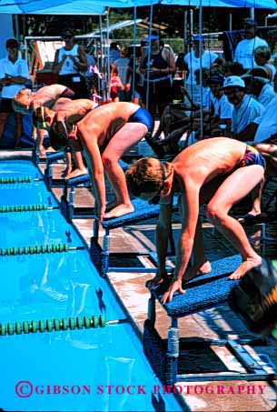 Stock Photo #1926: keywords -  bathing boys children competition effort exercise physical pool race recreation sport start suit summer swim vert