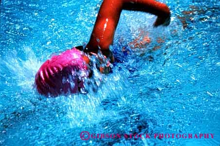 Stock Photo #1927: keywords - action blur competition girl hair horz motion move race speed splash swim water