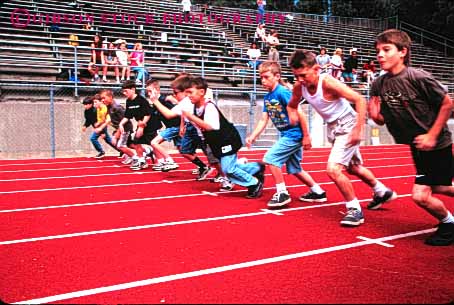 Stock Photo #6043: keywords -  and athlete athletic attempt boy boys child children class competition contest effort elementary field fifth foot grade horz practice race racer racers racing run runner runners running school sport start strength together track try