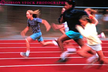 Stock Photo #6045: keywords -  action and athlete athletic attempt blur child children class competition contest dynamic effort elementary ethnic field fifth foot girl girls grade horz mixed motion move movement practice race racer racers racing run runner runners running school sport strength together track try