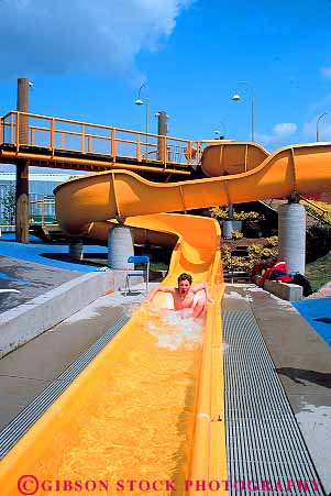Stock Photo #13726: keywords -  boys british canada child children columbia down dropping drops fall falling falls fun granville gravity island material outdoor park plastic play playing pool pools recreation slide slides splash splashes splashing summer swim swimming synthetic thrill thrilling thrills vancouver vert water waterslide waterslides yellow youth