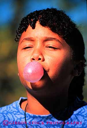 Stock Photo #1931: keywords - african air american black blow bubble child eat ethnic food girl gum model play released round vert