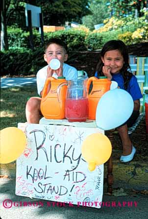 Stock Photo #1932: keywords -  aid boy business child children cute drink ethnic girl hispanic kool lemonade refresh sell stand vert