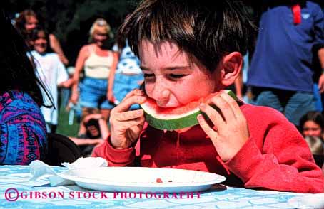 Stock Photo #1936: keywords -  boy eat face food horz model released summer vegetable watermelon