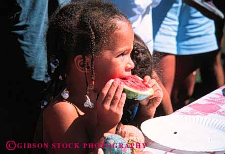 Stock Photo #6037: keywords -  african american black child cute eat ethnic food fresh fruit girl horz minority old six slice summer watermelon years