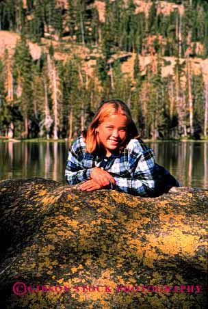 Stock Photo #1943: keywords -  adventure cl girl lake model outdoor pose released rock vert