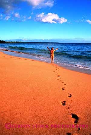 Stock Photo #1914: keywords -  air alone arm arms beach beaches carefree child children coast coastal expression foot footprint footprints freedom girl girls hawaii hawaiian impression impressions in islands kid kids ocean overhead play print prints raise raised raises raising recreation relax released sand sandy sea sky skyward skywards solitary solitude stroll strolling strolls summer surf track tracks up upward upwards vert walk walking walks warm water youth