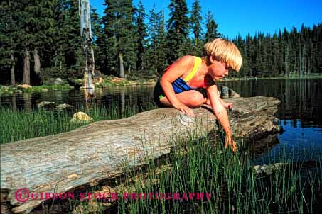 Stock Photo #1955: keywords - alone bathing explore girl horz inquire lake landscape model nature outdoor released scenic solitude suit summer swim touch water