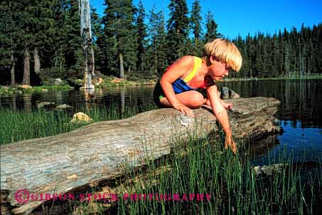 Stock Photo #1955: keywords -  alone bathing explore girl horz inquire lake landscape model nature outdoor released scenic solitude suit summer swim touch water