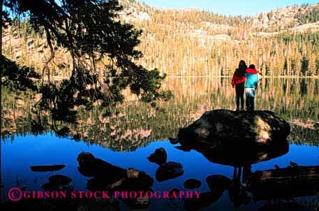 Stock Photo #1960: keywords -  adventure children couple explore friends girl horz hug lake landscape model outdoor reflection released scenic sister together water