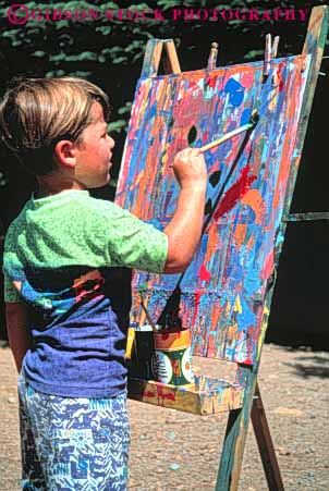 Stock Photo #3350: keywords - art boy brush children colorful create easel outdoor paint preschool released skill summer vert