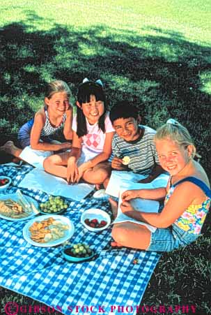 Stock Photo #3359: keywords -  boy child children cooperate ethnic food friend girl group outdoor picnic released summer together vert