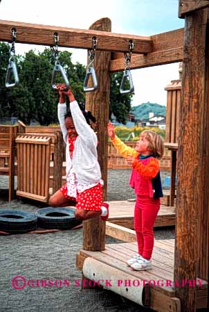 Stock Photo #1972: keywords -  african american black child children ethnic exercise friend girl girls hang mix model outdoor play playground recreation released social vert