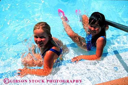 Stock Photo #1991: keywords - asian ethnic friend girl group horz mix model outdoor play pool pose recreation released share smile social swim