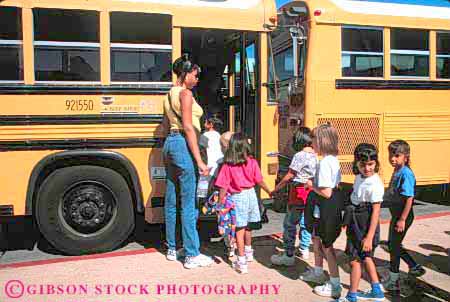 Stock Photo #6091: keywords - adolescence adolescent african american black board boy bus caution child children class direction educate education elementary ethnic field first girl girls grade group horz line minority mixed outdoor play race school summer supervisor teach teacher together trip young