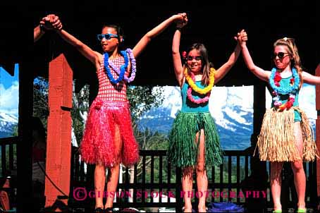 Stock Photo #2029: keywords -  boy child costume cute ethnic girl girls group harmony horz model music perform released show sing skill sound stage sunglasses