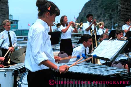 Stock Photo #6088: keywords -  adolescence adolescent band child children girl group harmony hit horz instrument music musical musician noise outdoor percussion perform performance performer play sound summer tap together xylophone young