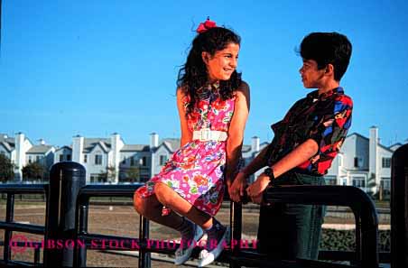 Stock Photo #2030: keywords - boy brother child children ethnic girl hispanic horz laugh model relax released share sister smile social talk