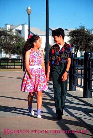 Stock Photo #2031: keywords - boy brother child children ethnic girl hispanic laugh model relax released share sister smile social talk vert