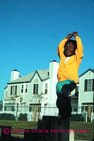 Stock Photo #2043: keywords -  african american black boy child ethnic game happy healthy model outdoor released run smile vert