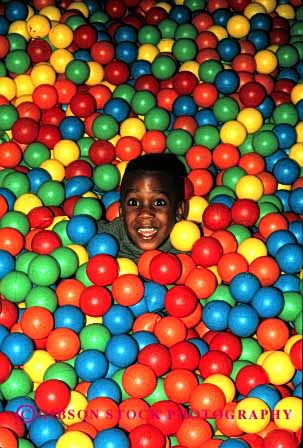 Stock Photo #2050: keywords -  african american balls black boy child colorful ethnic game happy healthy not released smile vert