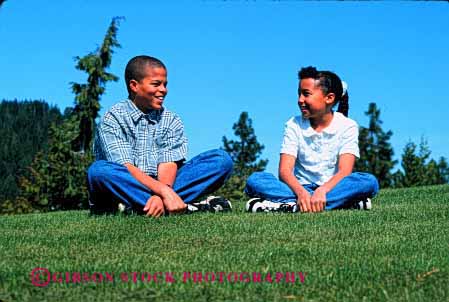 Stock Photo #2053: keywords -  african american black boy child ethnic friends game girl happy healthy horz model outdoor relax released share smile social talk together