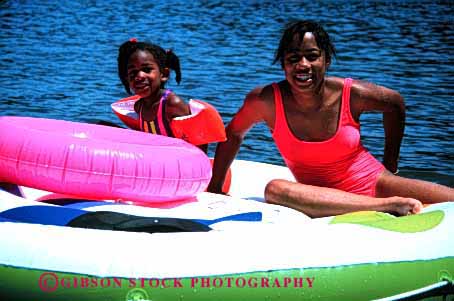 Stock Photo #2058: keywords - african american black child ethnic exer girls happy healthy horz model released smile swim