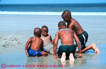 Stock Photo #2061: keywords -  african american birmingham black boy child children demonstration discovery ethnic exhibit experiment family game hands horz interact mother not participate physics place released science test