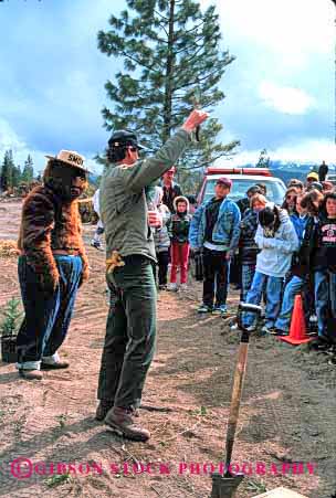 Stock Photo #2065: keywords -  bear child children class conservation cooperate costume demonstration discussing ecology elementary environment field forest forester forestry girls group grow help history kid kids natural nature people person pine plant project public ranger rangers reforestation school schools service smoky students teach teacher teaches teaching team trees trip vert with