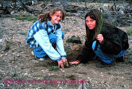 Stock Photo #2068: keywords - biology california child children class conservation cooperate dirt earth education elementary environment environmental for forest girl girls grow help hole horz in kid kids model mt outdoor outdoors outside pair pine plant planting plants project projects public reforestation school service shasta student students team tree trees two youth