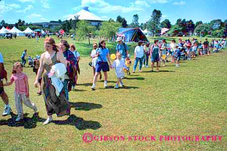 Stock Photo #2085: keywords -  audience crowd crowded group horz in large line many massive multitude numerous patience people populous summer wait