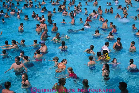 Stock Photo #6085: keywords -  count countless crowd group horz in lots many mass massive multitude numerous people pool swim swimmer swimming together water