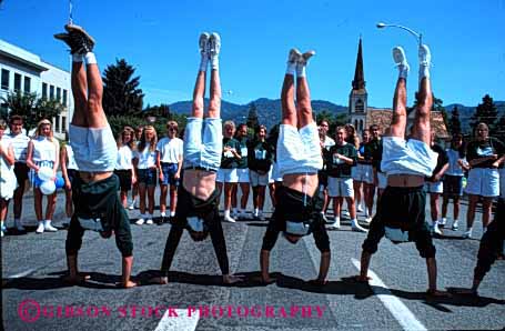 Stock Photo #2090: keywords -  balance college coordinate different display down gymnast gymnastic handstand horz men parade side summer team up