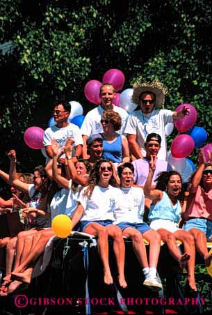 Stock Photo #2102: keywords -  cheer coeds college friends group happy noise not parade released student summer team vert wave yell