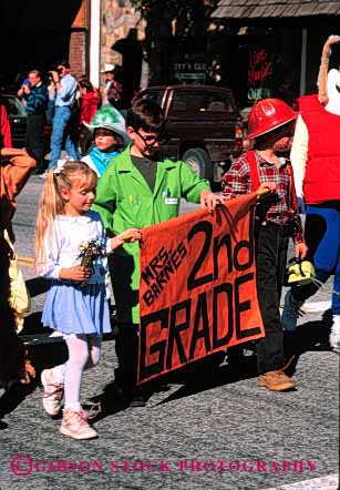 Stock Photo #2107: keywords -  boy children class costume elementary friends girl halloween not parade released school together vert walk