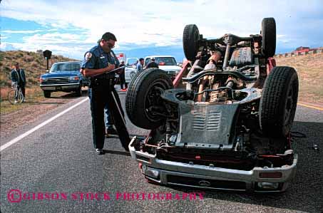 Stock Photo #2138: keywords -  accident accidents auto car cars caution claim collision collisions crash damage danger horz injury insurance investigate job loss occupation police property report rollover traffic vehicle vehicles work wreck wrecked