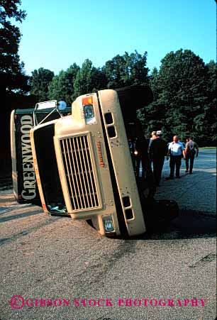 Stock Photo #2139: keywords -  accident caution claim collision danger insurance pro rollover truck vert