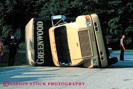 Stock Photo #2140: keywords -  accident auto caution claim collision crash damage danger horz injury insurance loss property rollover traffic truck vehicle