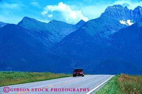 Stock Photo #2156: keywords -  auto car drive highway horz montana mountains moving road rocky rural scenic street transportation vehicle