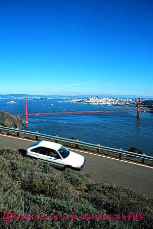 Stock Photo #2168: keywords -  auto bay car coast drive highway moving ocean road scenic shore street transportation urban vehicle vert