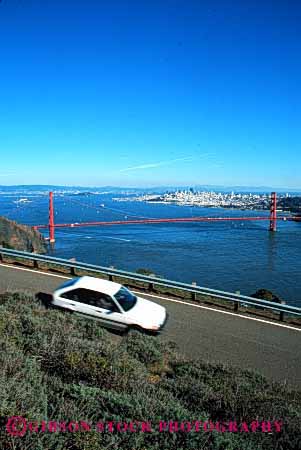 Stock Photo #2168: keywords - auto bay car coast drive highway moving ocean road scenic shore street transportation urban vehicle vert