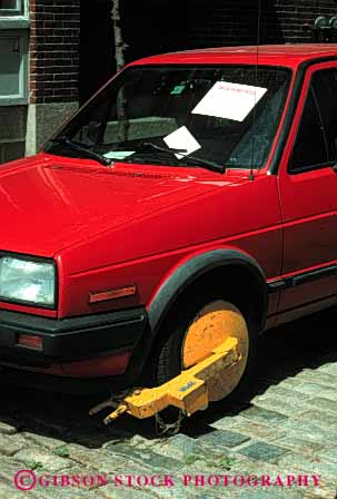 Stock Photo #2180: keywords -  auto boot car clamp denver enforcement expire lock park parked parking punishment tire vehicle vert violation wheel